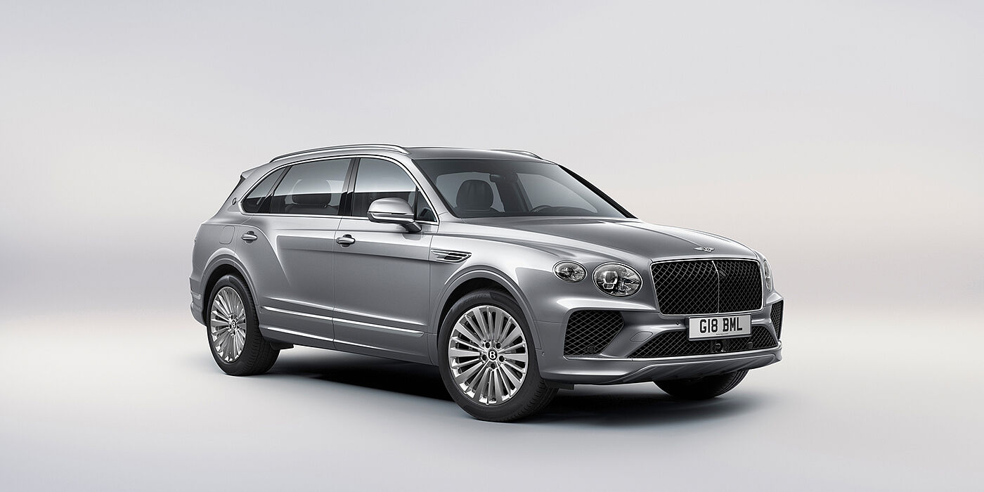 Bentley Hong Kong - DCH Bentley Bentayga Extended Wheelbase luxury SUV front three quarter view in Moonbeam paint with 21 inch five spoke painted wheels