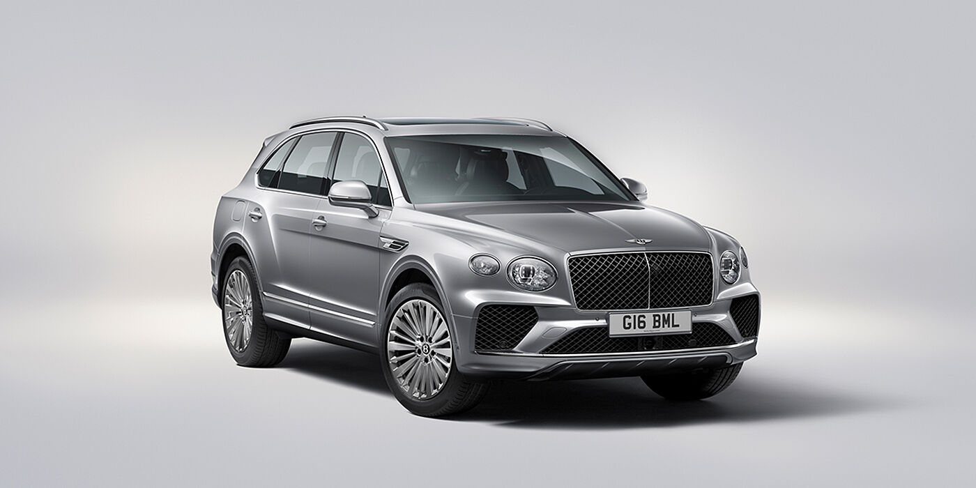 Bentley Hong Kong - DCH Bentley Bentayga luxury SUV front three quarter view in Moonbeam paint with matrix grille and 21″ 5 spoke painted wheels