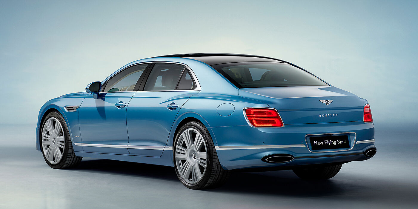 Bentley Hong Kong - DCH New Bentley Flying Spur Azure sedan rear view in Light windsor blue by Mulliner paint with 22 inch Azure wheels and chrome exterior details