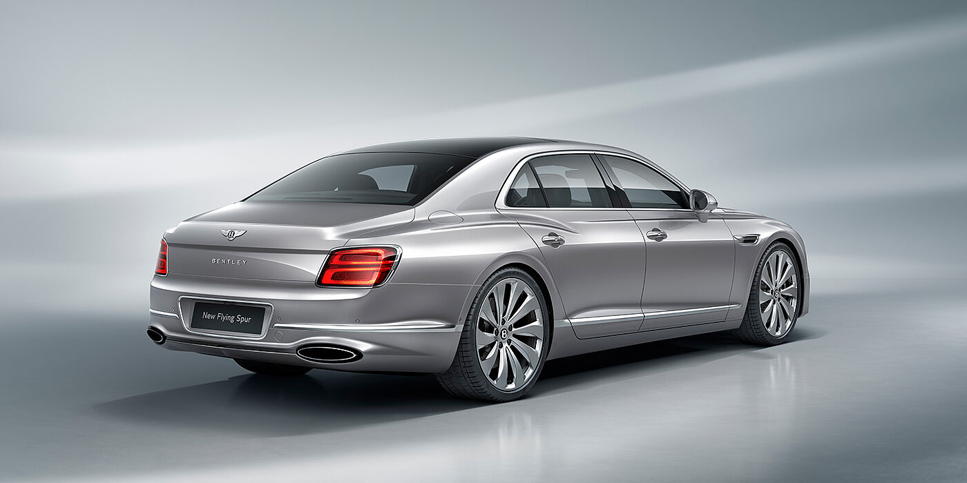 Bentley Hong Kong - DCH New Bentley Flying Spur sedan rear view in Silverlake paint with ten spoke wheels and chrome matrix grille