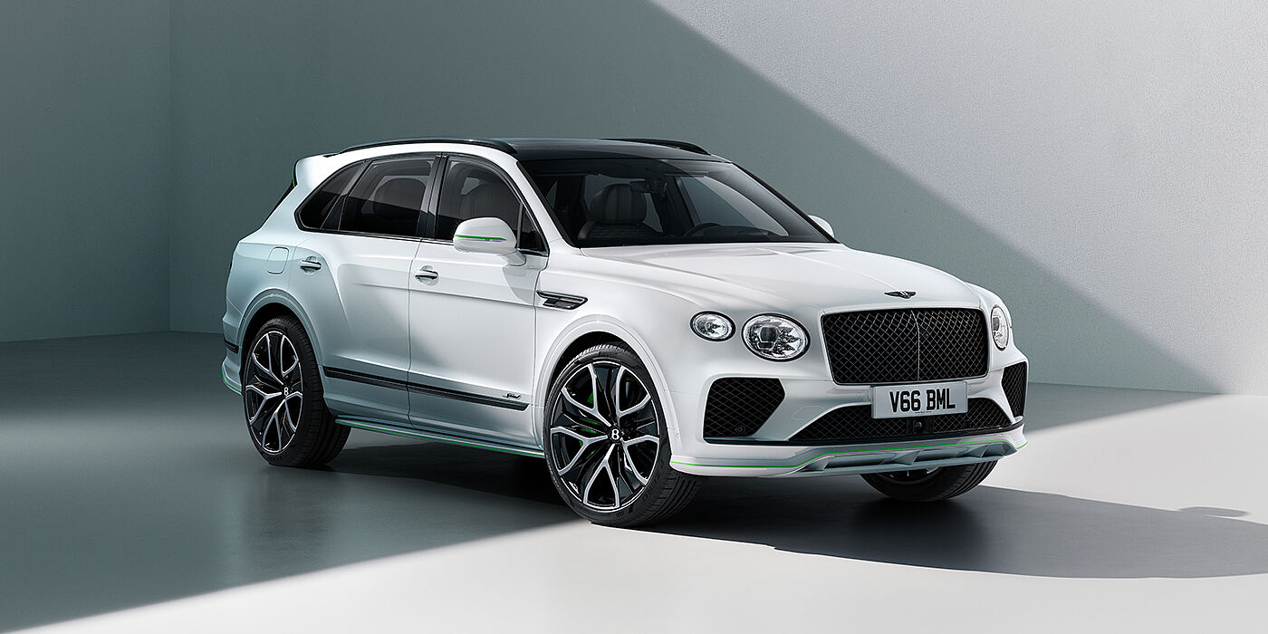 Bentley Hong Kong - DCH Bentley Bentayga Speed SUV front three quarter in Snow Quartz Pearlescent by Mulliner white paint against a grey wall