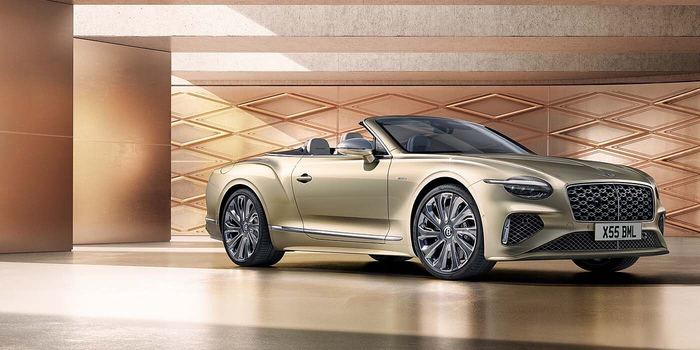 Bentley Hong Kong - DCH Bentley New Continental GTC Mulliner V8 hybrid front three quarters in Patina paint