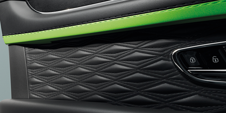 Bentley Hong Kong - DCH Bentley Bentayga Speed SUV interior door detail with Diamond in Diamond stitched hide in Beluga black colour, with Black stained Crown Cut Walnut veneer