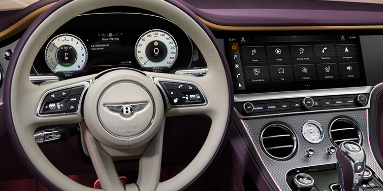 Bentley Hong Kong - DCH Bentley Continental GTC Mulliner convertible steering wheel and drivers screens surrounded by Damson purple and Linen hides